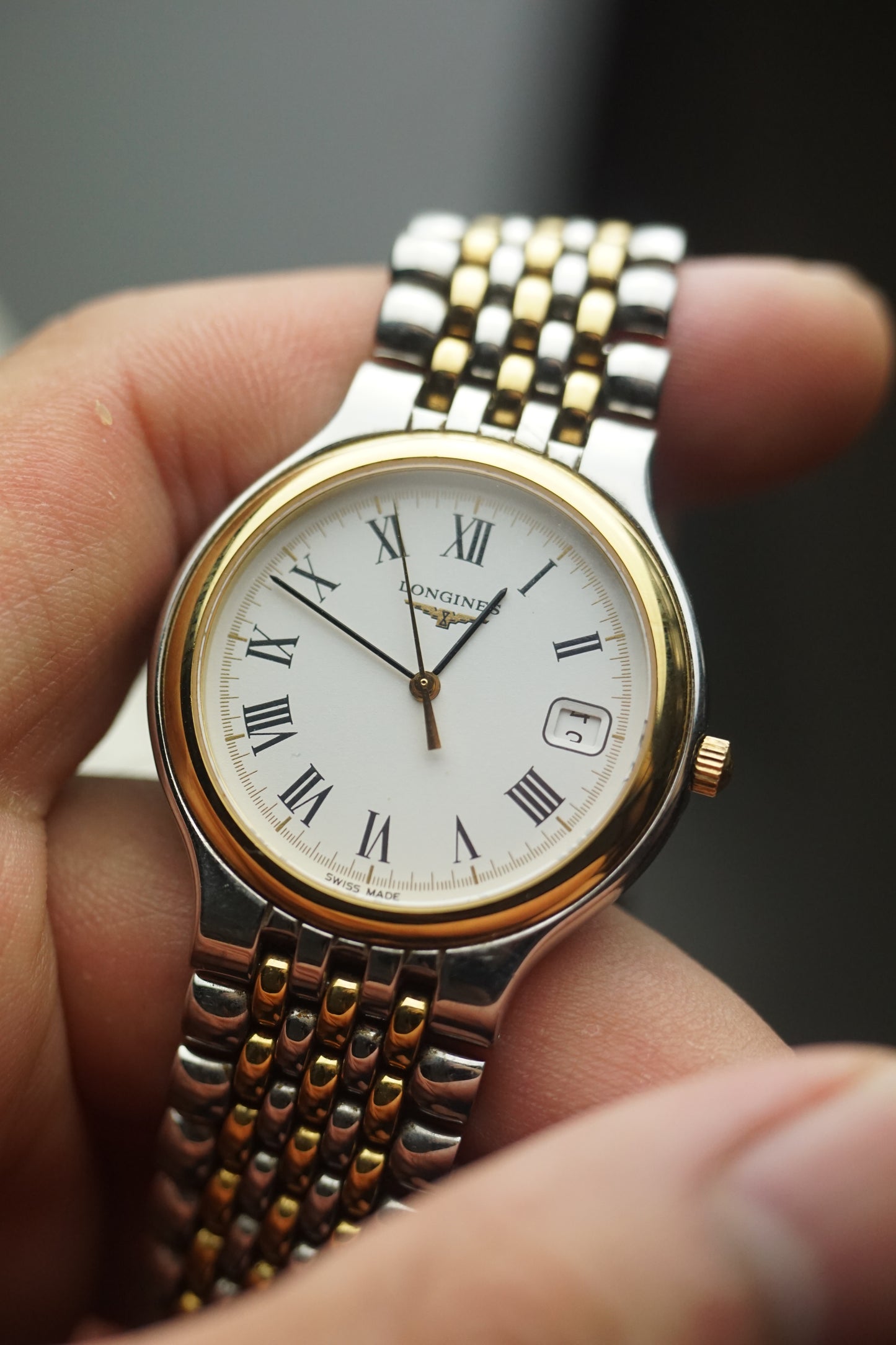 longines men bead of rice bracelet with Roman numerals