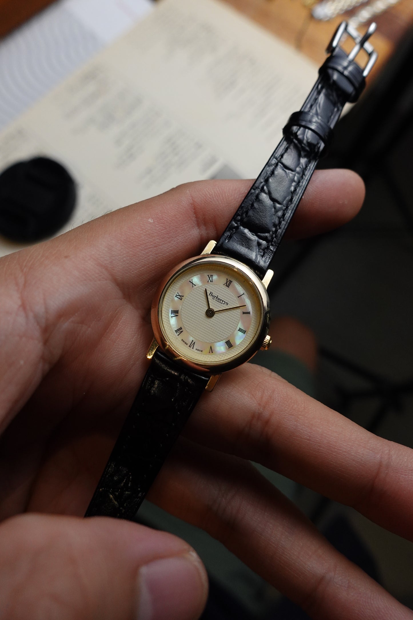 Burberry mother of pearl dial ladies swiss made variation