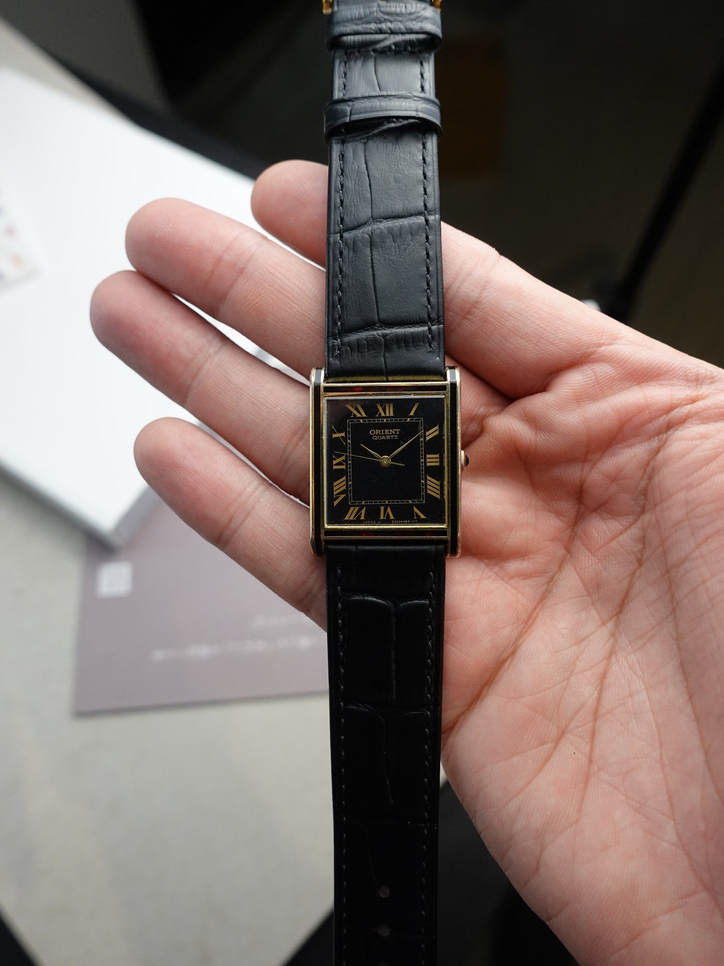Orient Tank Art Deco case with ruby lacquer inserts on case