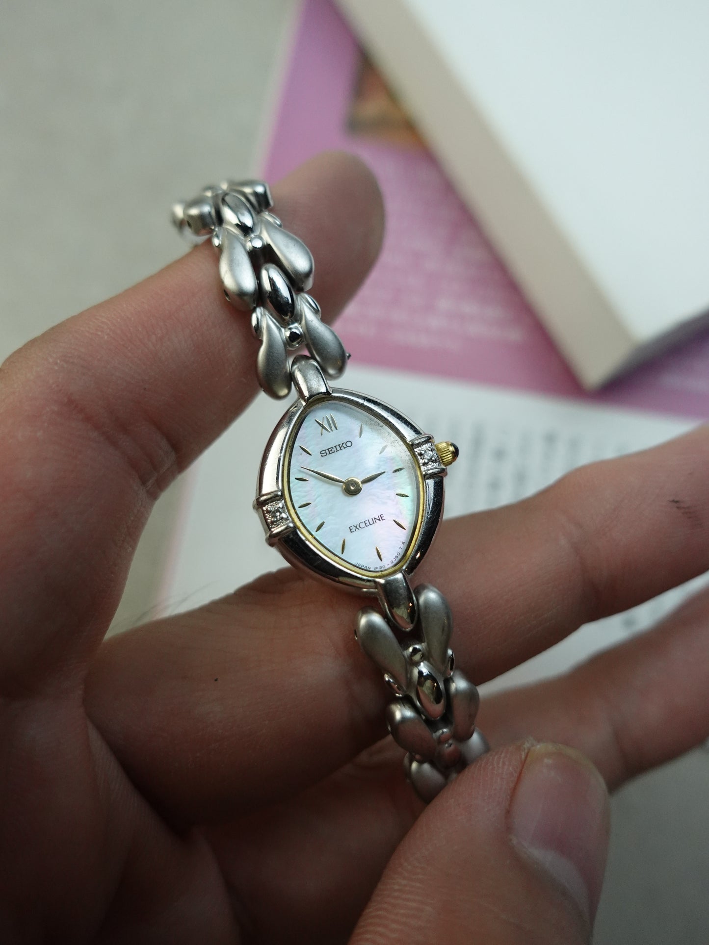 Seiko Exceline bracelet with rainbow mother of pearl