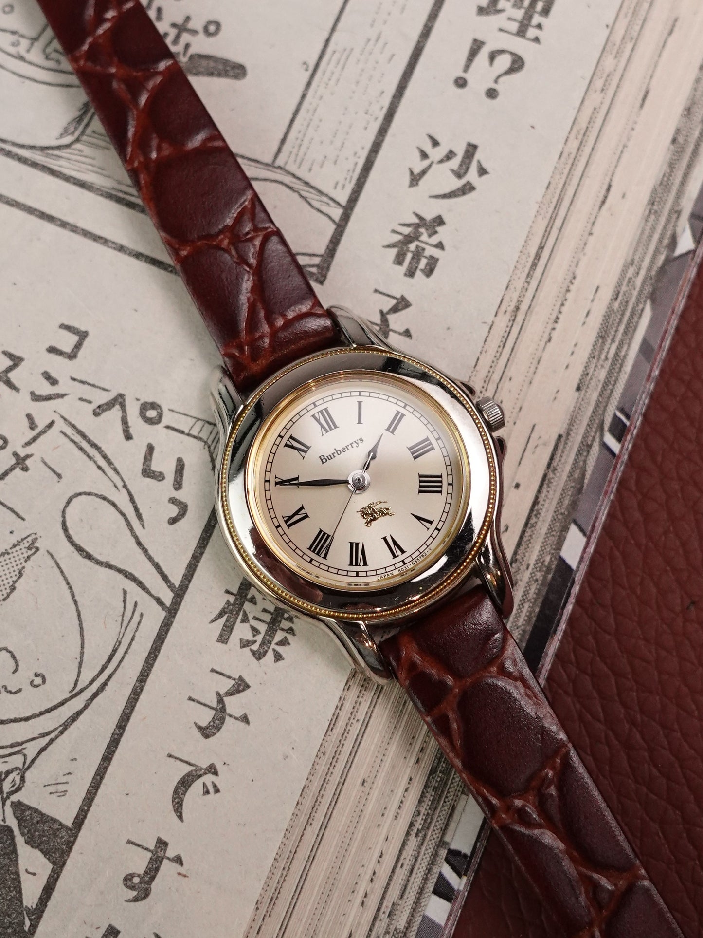 Ladies's Burberry classic Roman numeral silver sunburst dial.