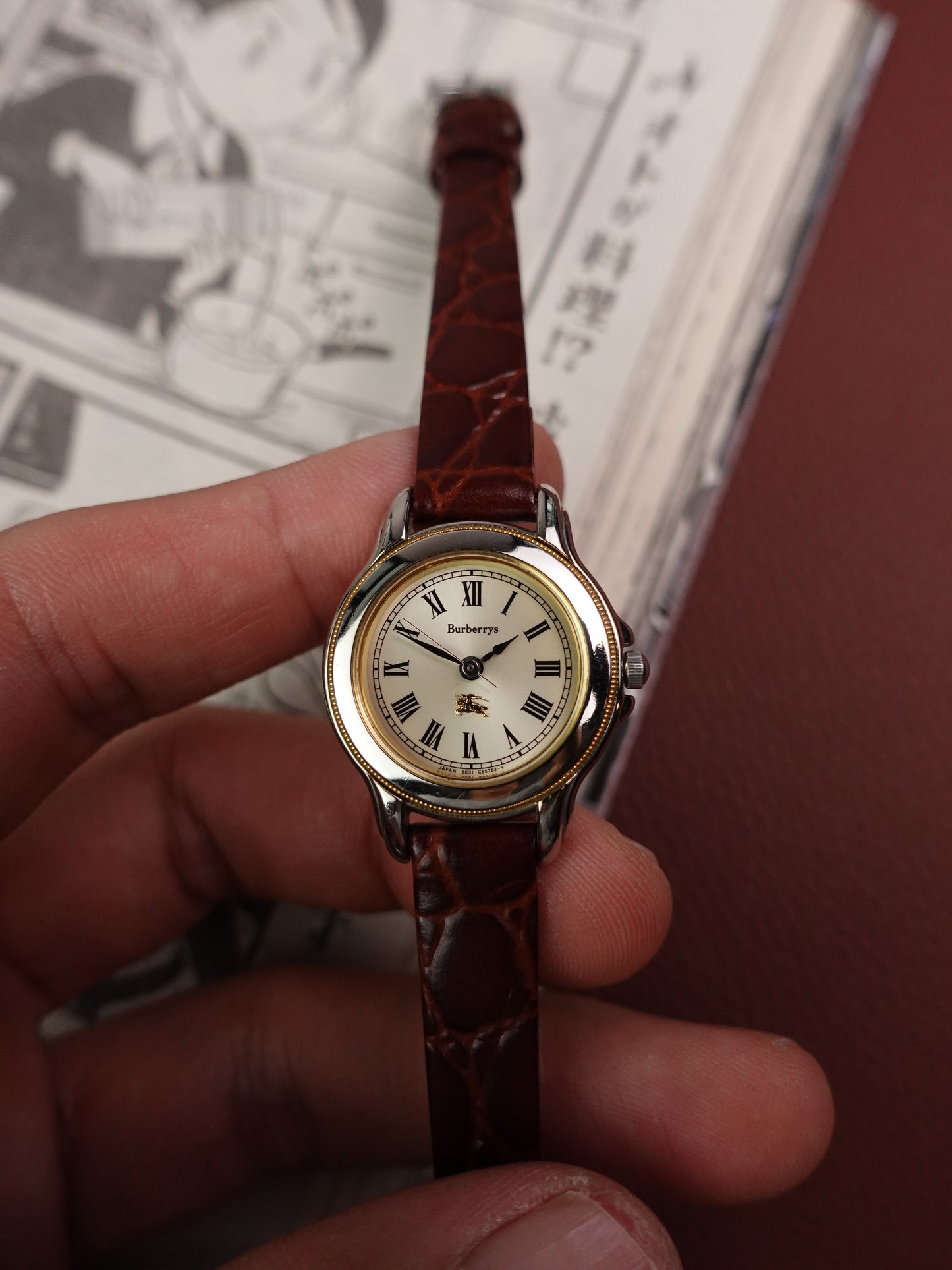 Ladies's Burberry classic Roman numeral silver sunburst dial.