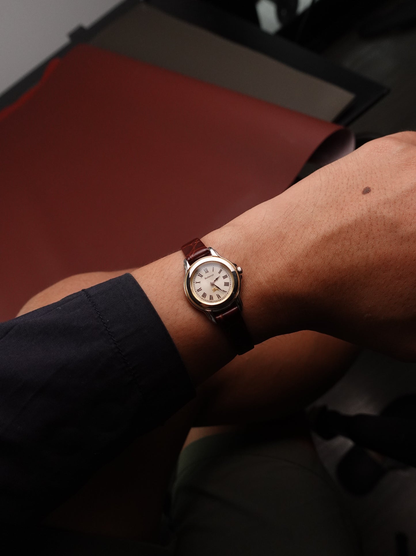 Ladies's Burberry classic Roman numeral silver sunburst dial.