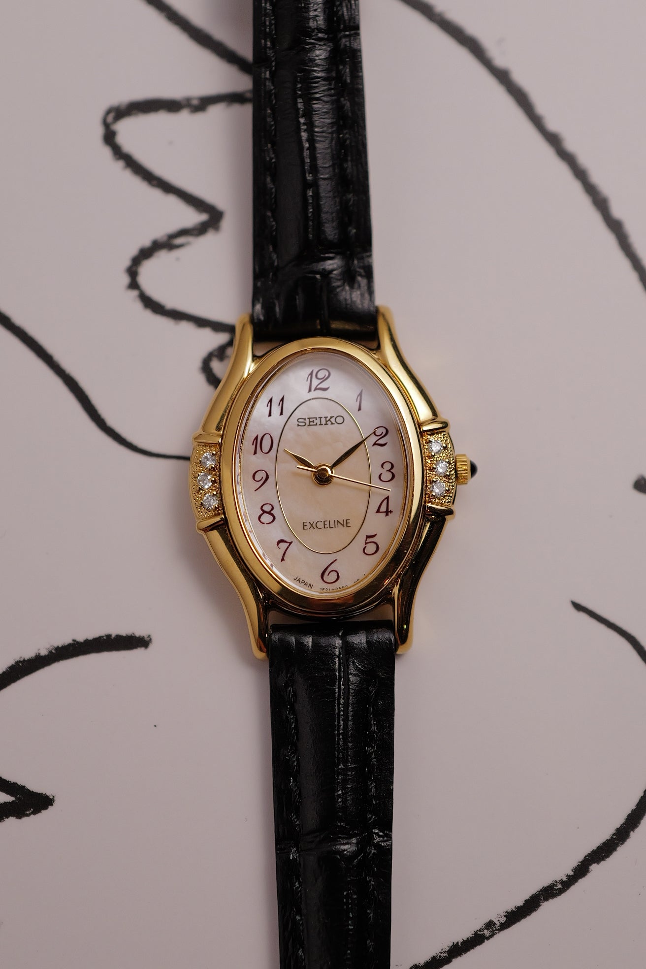 Seiko Exceline Art Deco Diamond Case with Mother of Pearl Dial