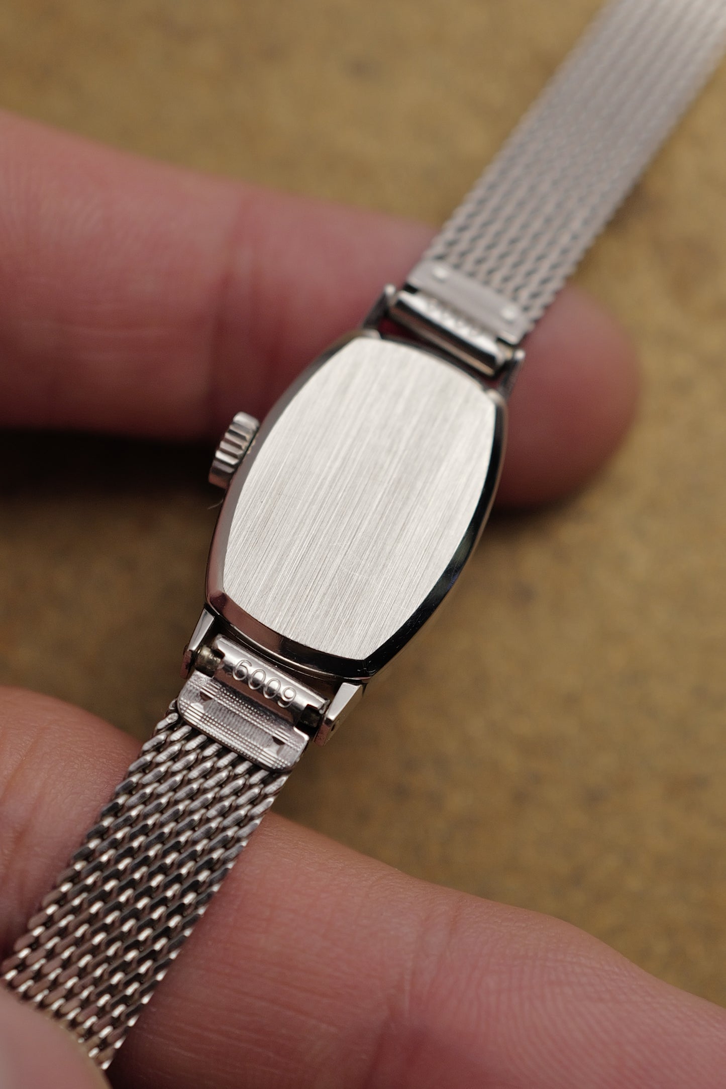 Omega Geneve Mini-Tonneau in steel Circa. 1960s with original bracelet