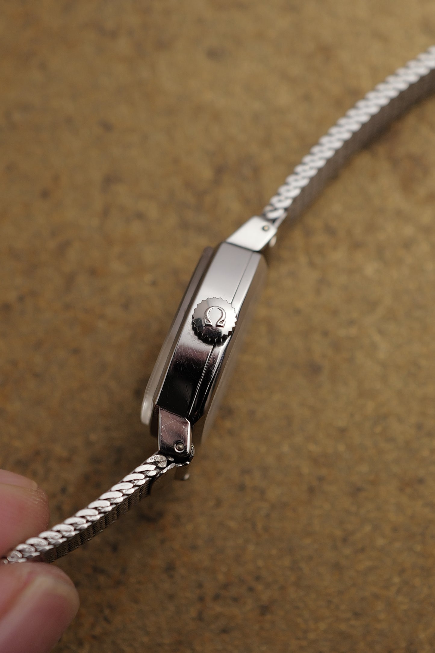 Omega Geneve Mini-Tonneau in steel Circa. 1960s with original bracelet