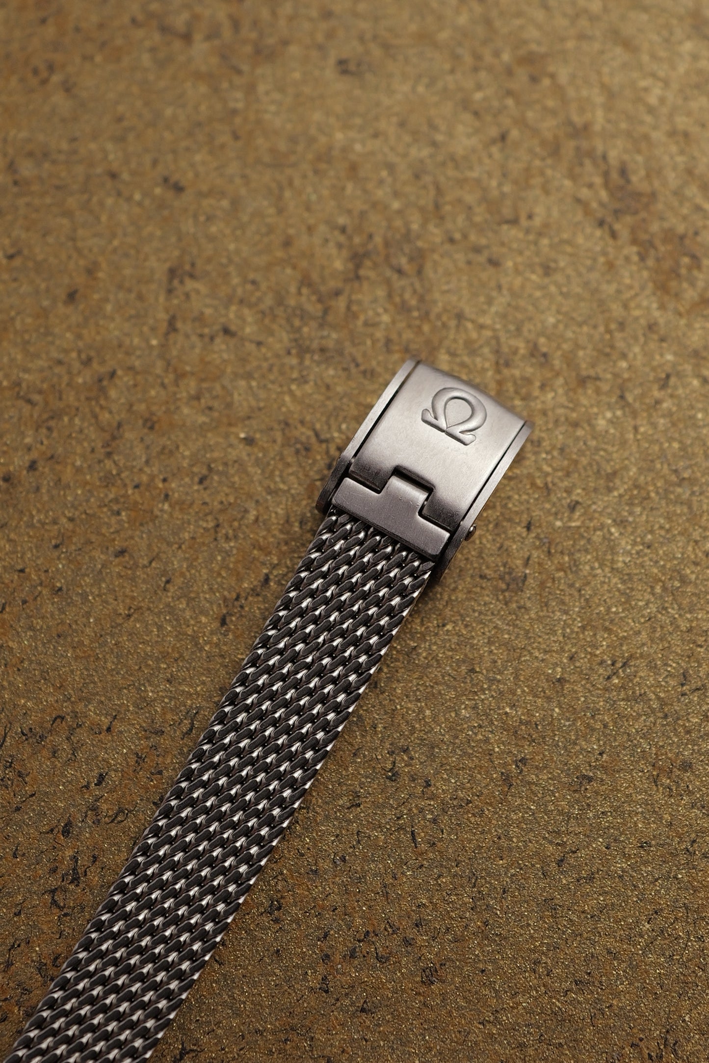 Omega Geneve Mini-Tonneau in steel Circa. 1960s with original bracelet
