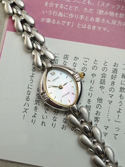 Seiko Exceline bracelet with rainbow mother of pearl