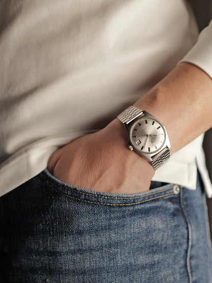 Omega Geneve Date Cushion-Tonneau Silver Domed Dial Ref. 136.041 (circa 1969)