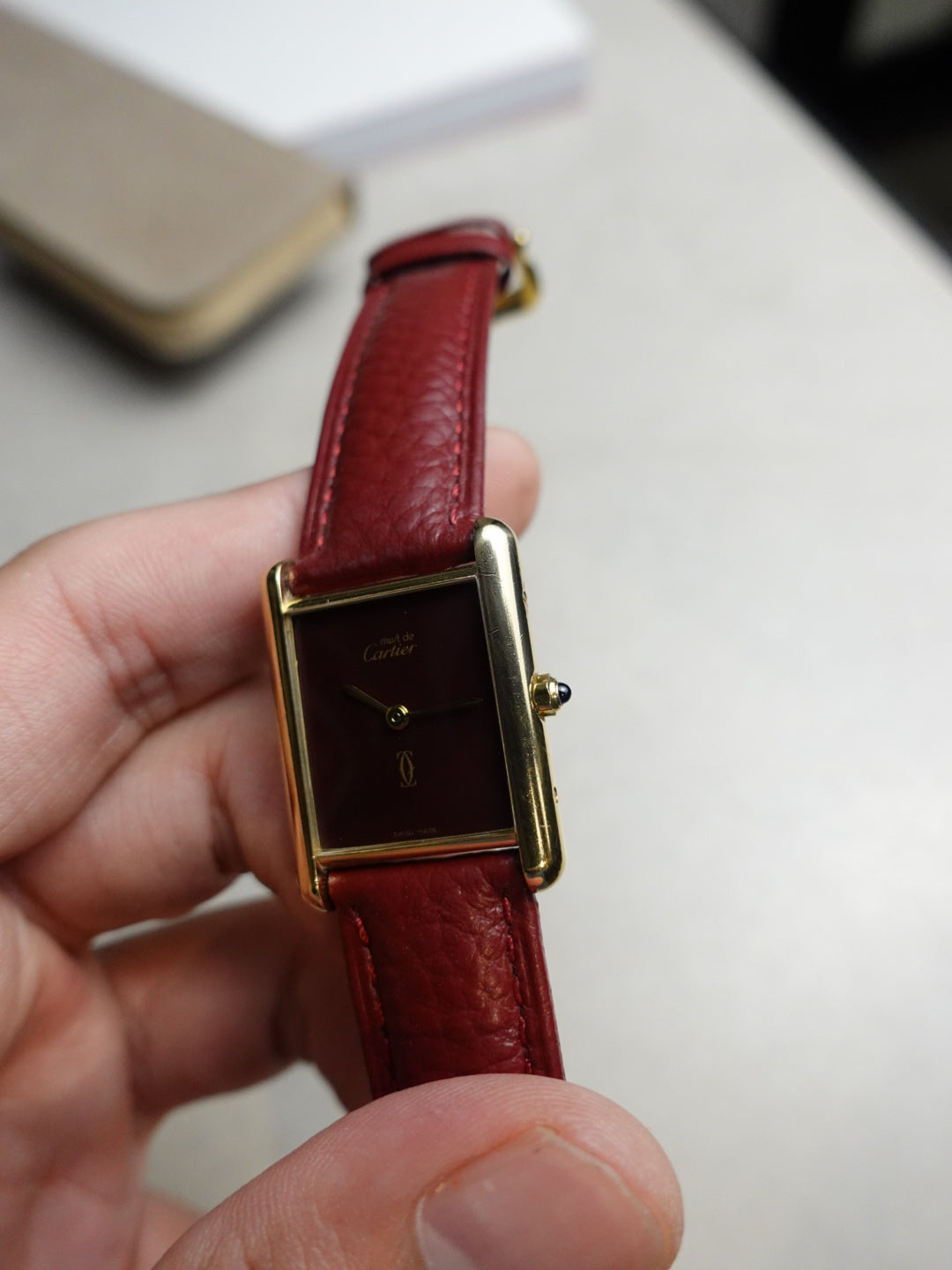 Tank Must de Cartier Burgandy Dial Large Quartz. International Cartier warranty