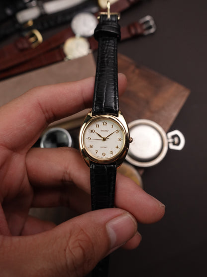 Seiko Lucent C-case 1f21-0K20 with Arabic Numerals