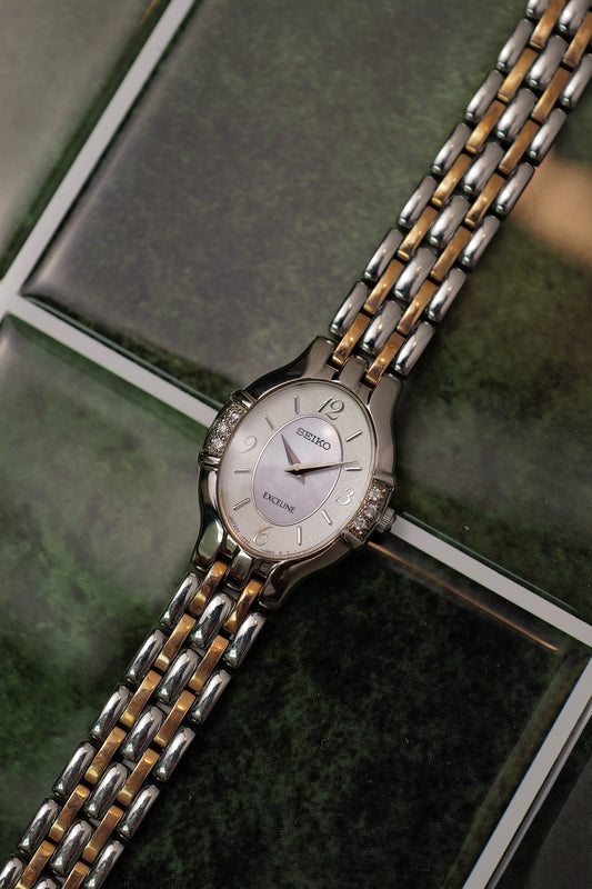 Seiko Exceline Oval with mother of pearl dial and bezel diamonds Circa. 1994 Full set