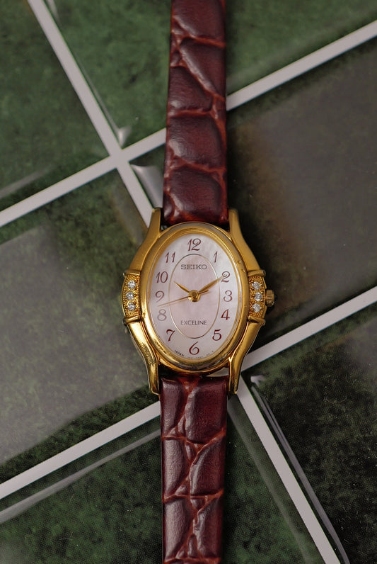 Seiko Exceline Art Deco Diamond Case with Pink Mother of Pearl Dial