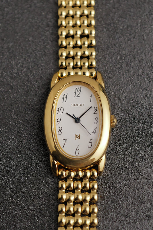 Seiko Ladies "Baignoire" Gold On custom bracelet Circa. 1995