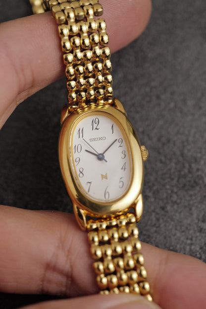 Seiko Ladies "Baignoire" Gold On custom bracelet Circa. 1995