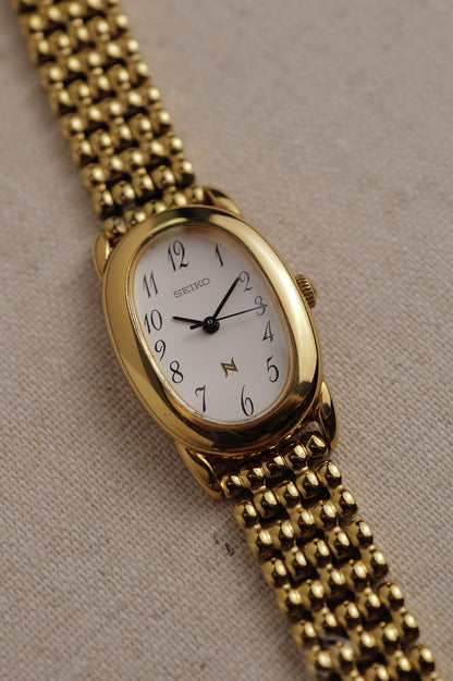 Seiko Ladies "Baignoire" Gold On custom bracelet Circa. 1995
