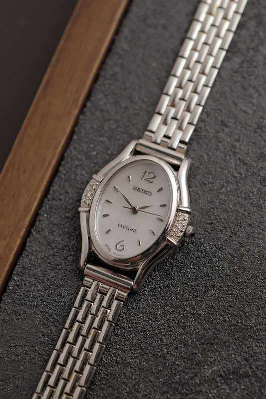 Seiko Exceline Mother of Pearl Diamond Bezel on custom bracelet Circa. 1992