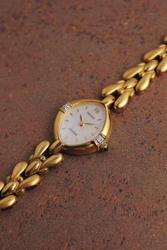Seiko Exceline Mother of Pearl dial Tear-drop Bracelet in Gold Circa. 1989