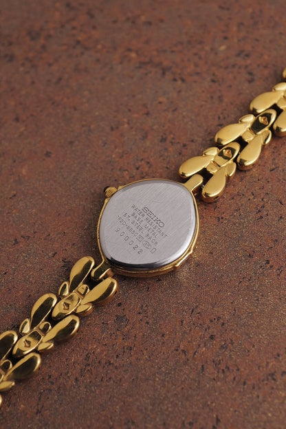 Seiko Exceline Mother of Pearl dial Tear-drop Bracelet in Gold Circa. 1989