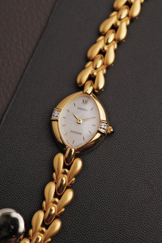 Seiko Exceline Mother of Pearl dial Tear-drop Bracelet in Gold Circa. 1989